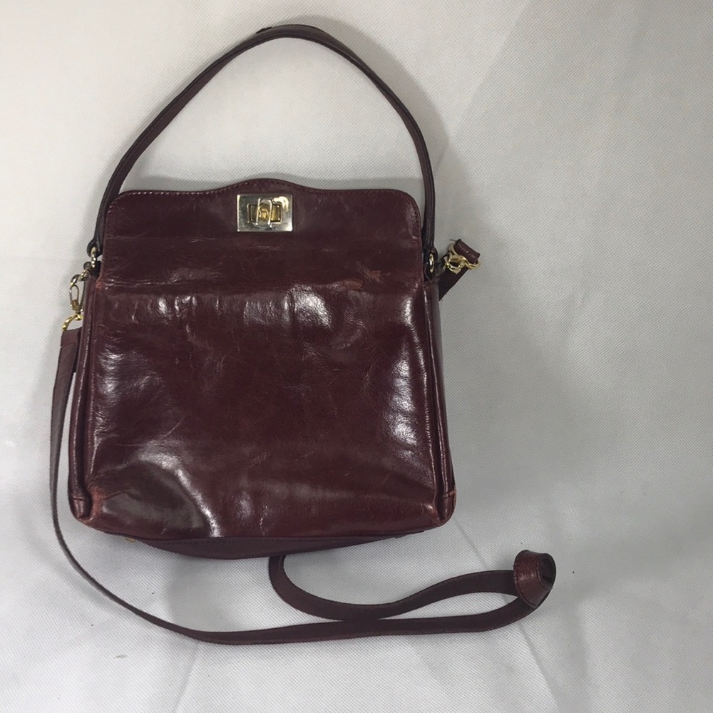 Vintage etienne Aigner bag.. color burgundy.